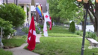 Red-and-white flags line KC neighborhood to honor health care workers