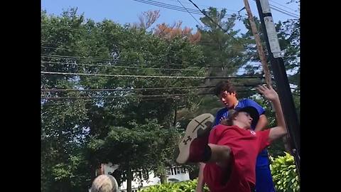 Friend Tries To Throw Alley-Oop To His Buddy But Wipes Out in Slo-Mo