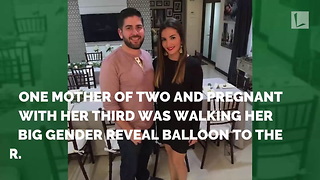 Mom Carrying Gender Reveal Balloon Doesn’t See Toddler Sneaking Up Behind Her with Toy Sword