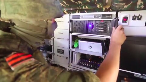 Mobile radio complex specialists transmit to citizens in liberated settlements