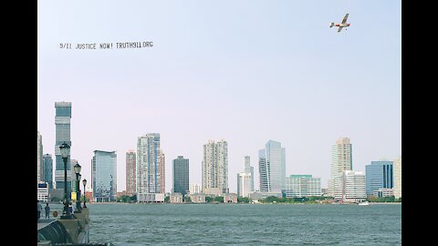 Truth911.org Plane pulling banner near Verrazano Bridge NYC Sept 12, 2021