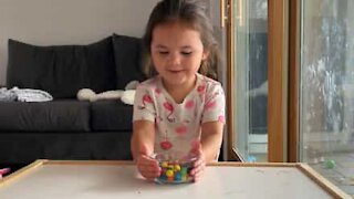Girl can't resist M&M's in "Don't Eat It Challenge"
