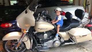 Max rides the Street Glide