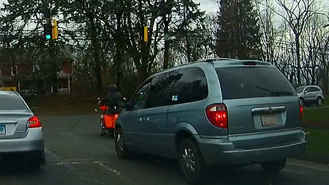 Motorcyclist unaware that he almost got hit