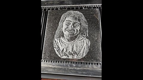 Engraving a photo onto granite. Granite Monument Photo Engraving Laser Engraving