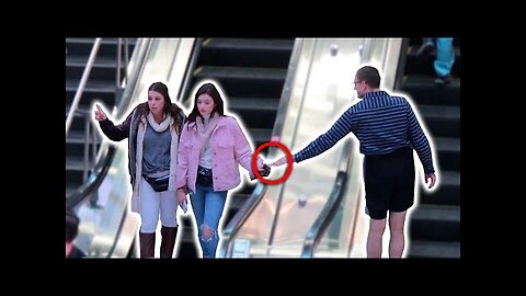 Enjoy nerd touching hands on the escalator!