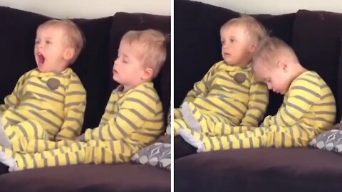 Toddler Falls Asleep During Cartoons, Twin Brother Helps Him Stay Awake
