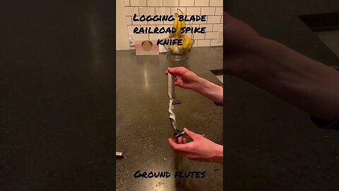 Logging blade railroad spike handle fluted