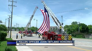 Local law enforcement honor and remember Officer Hetland day of funeral
