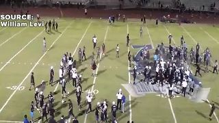 Police pepper spray crowd during fight after high school football game