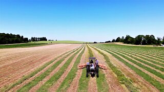 Drone footage shows beautiful views of farmers hard at work