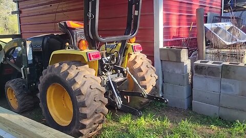 Farm Chores. Cleaning up the chicken pens.