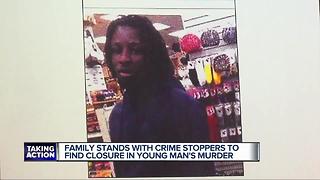 Family stand with Crime Stoppers to find closure in young man's murder