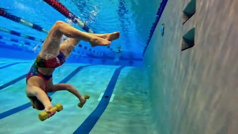 Flips With Weights in the Swimming Pool