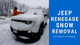 Cleaning Snow Off a Jeep Renegade Sport in New England