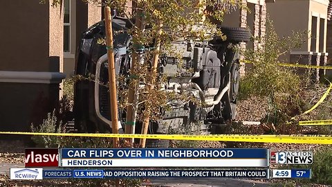 SUV flips in Henderson, lands in homeowner's front yard