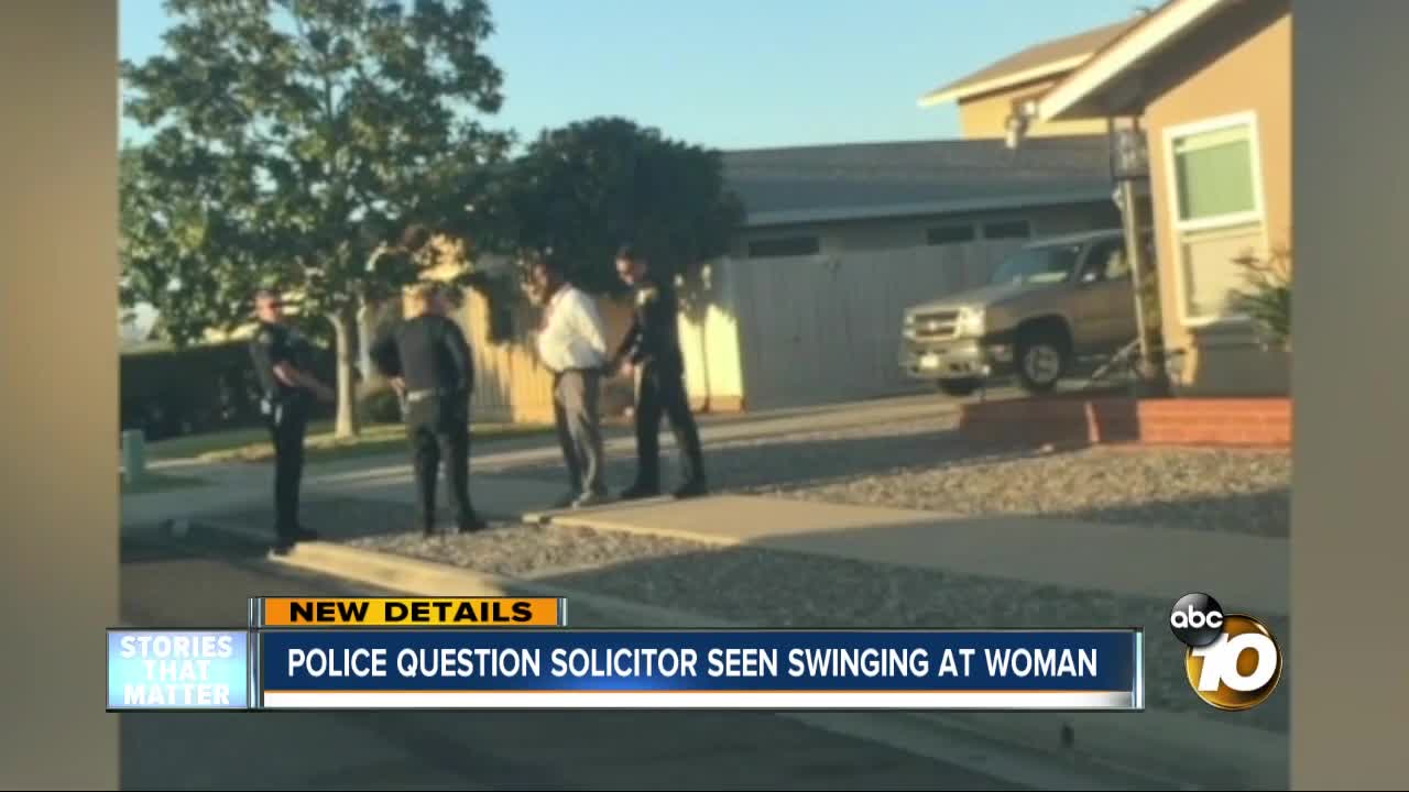 Police question solicitor seen swinging at woman