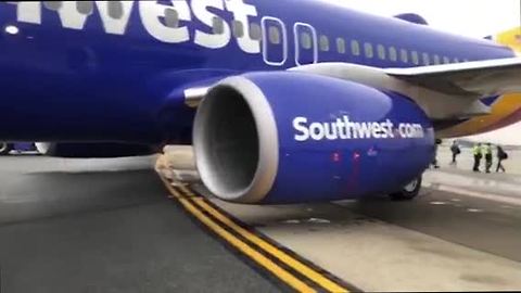 Southwest plane slides off runway