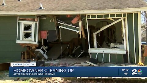 Driver crashes truck into West Tulsa house