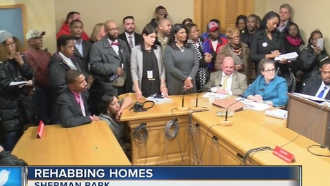 Hundreds fill City Hall hoping for $1 homes