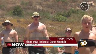 Hikers brave the heat at Cowles Mountain
