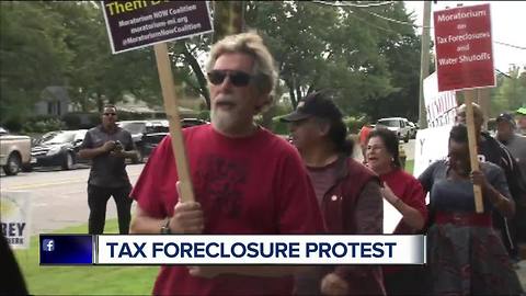 Tax foreclosure protest outside Wayne County Treasurer's home