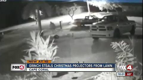 Grinch Steals Christmas Projectors from Lawn