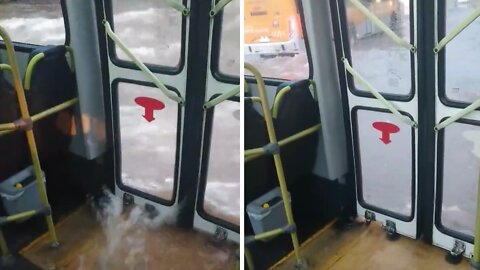 Water pours into bus during extreme flood in Porto Alegre, Brazil