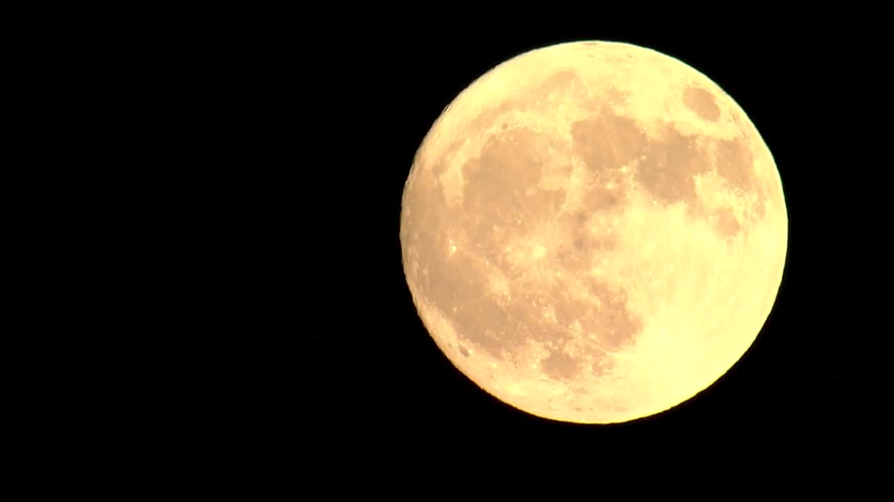 Near full moon over Denver metro area