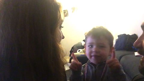 Cute Kid Doesn't Approve With His Parents Kissing