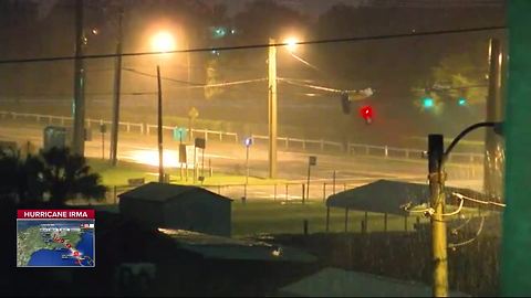 Street lights violently tossed by Hurricane Irma winds