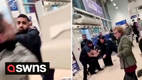 Mass brawl breaks out at UK supermarket as fearless pensioner casually continues shopping