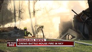 Crews battle house fire in NKY
