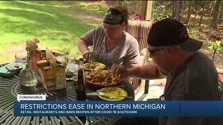Businesses reopen as restrictions east in northern Michigan
