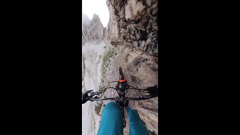 Biker takes crazy path along cliff edge! || World Global