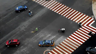 Chinese Street Sweeper in Traffic