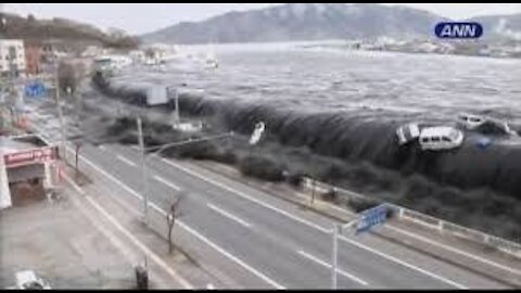 CAUGHT IN THE MIDDLE OF TSUNAMI