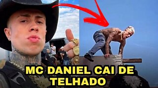 MC DANIEL CAI DE CIMA DE UM TELHADO