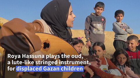 Palestinian woman plays oud to cheer children amid Israel-Hamas war