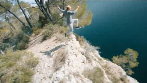 Epic cliff jumping captured by drone