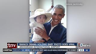 Photo of Barack Obama holding baby goes viral