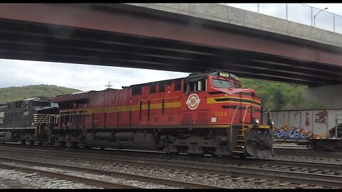 NS Heritage unit 8114 with a mix meets an intermodal.