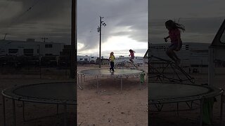 Scarlett and Tasha on the trampoline.