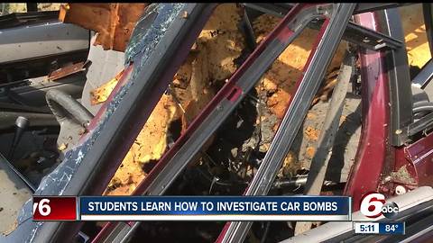 Car explosion demo gives students chance to learn how to investigate a car bomb