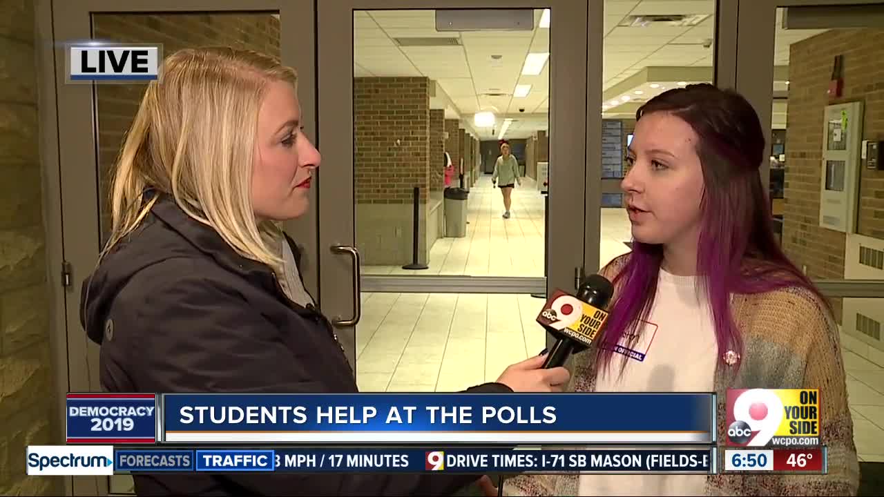 Students help at the polls