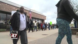 Protest group marches at MSP headquarters in Dimondale