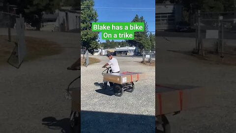 Blake with a bike on a trike