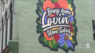 Dayton heals: Mural brings 'some lovin' to Oregon District after chaotic 12 months