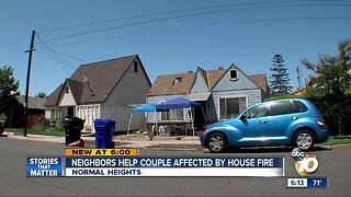 Neighbors help couple affected by house fire