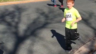 A Little Boy Stops To Hug His Mom During A Race